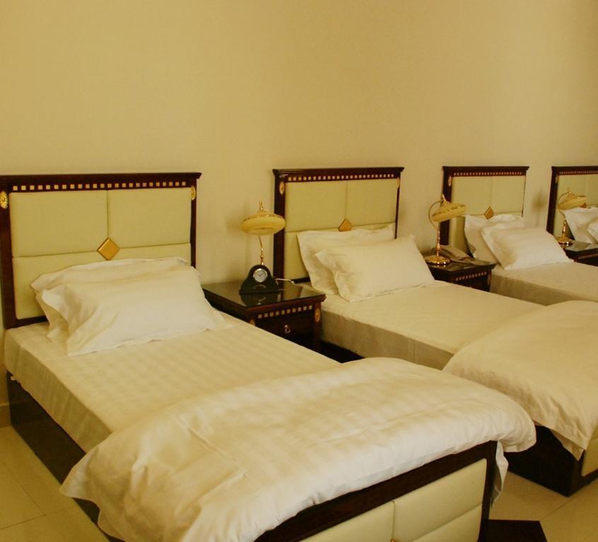 City Hotel Салалах Стая снимка