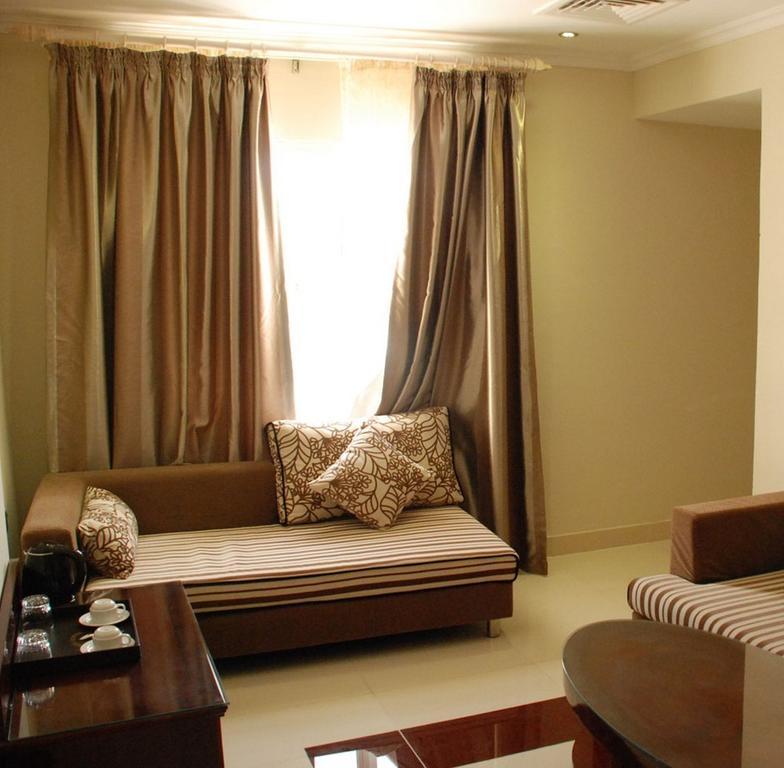 City Hotel Салалах Стая снимка